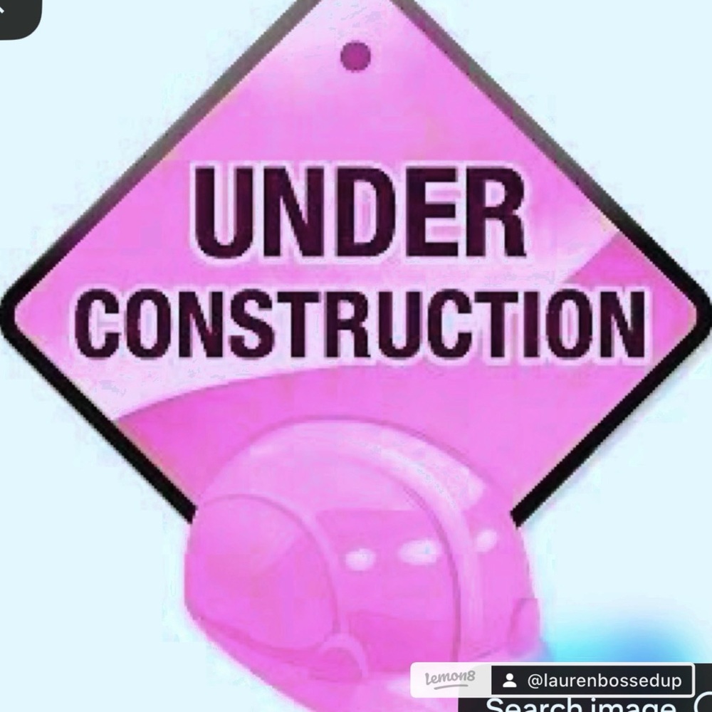 Pink Under Construction Sign